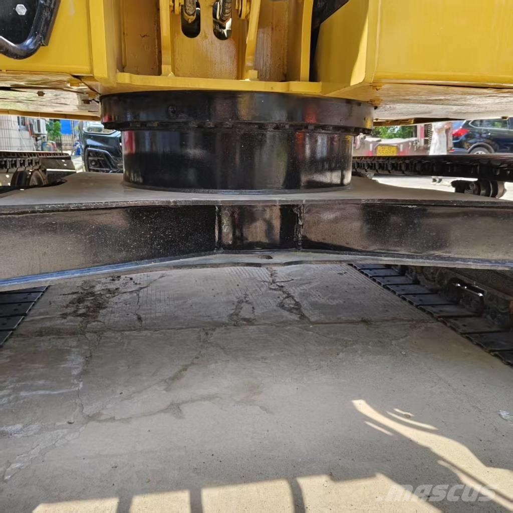 CAT 310 Rupsgraafmachines