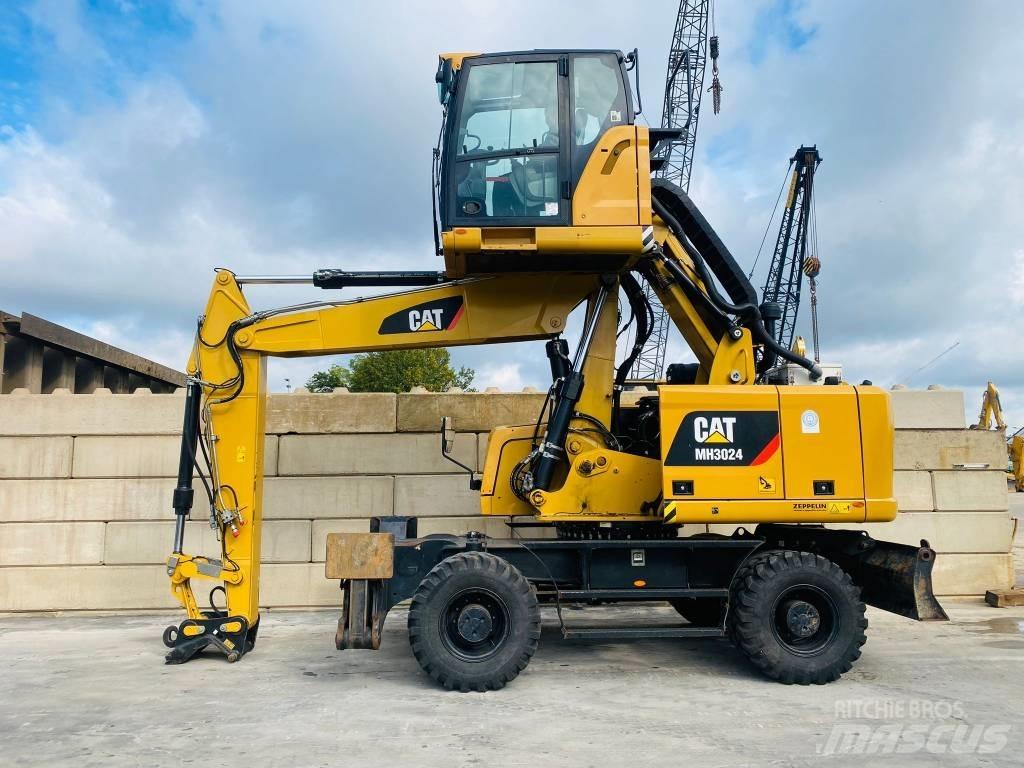 CAT mh3024 Wielgraafmachines