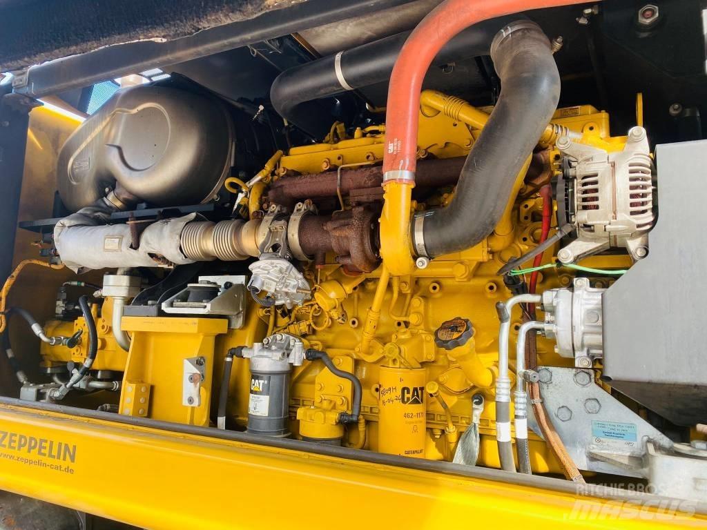 CAT mh3024 Wielgraafmachines