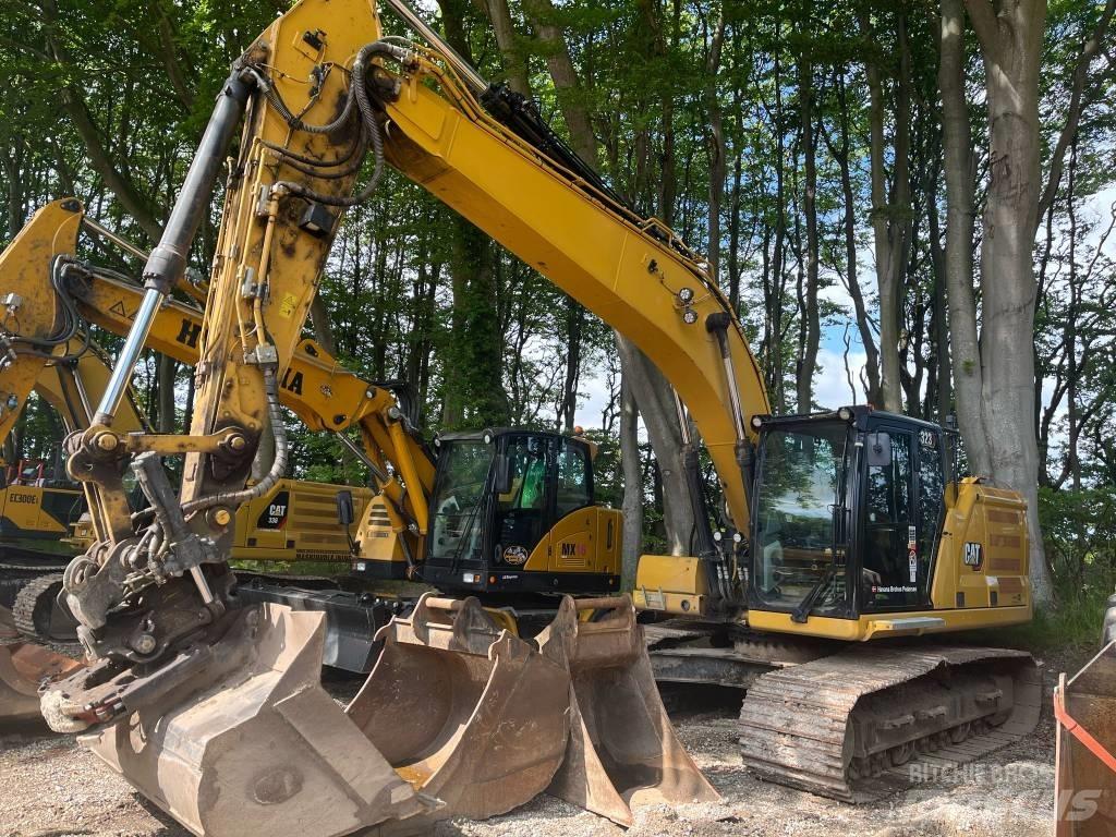 CAT 323 Rupsgraafmachines