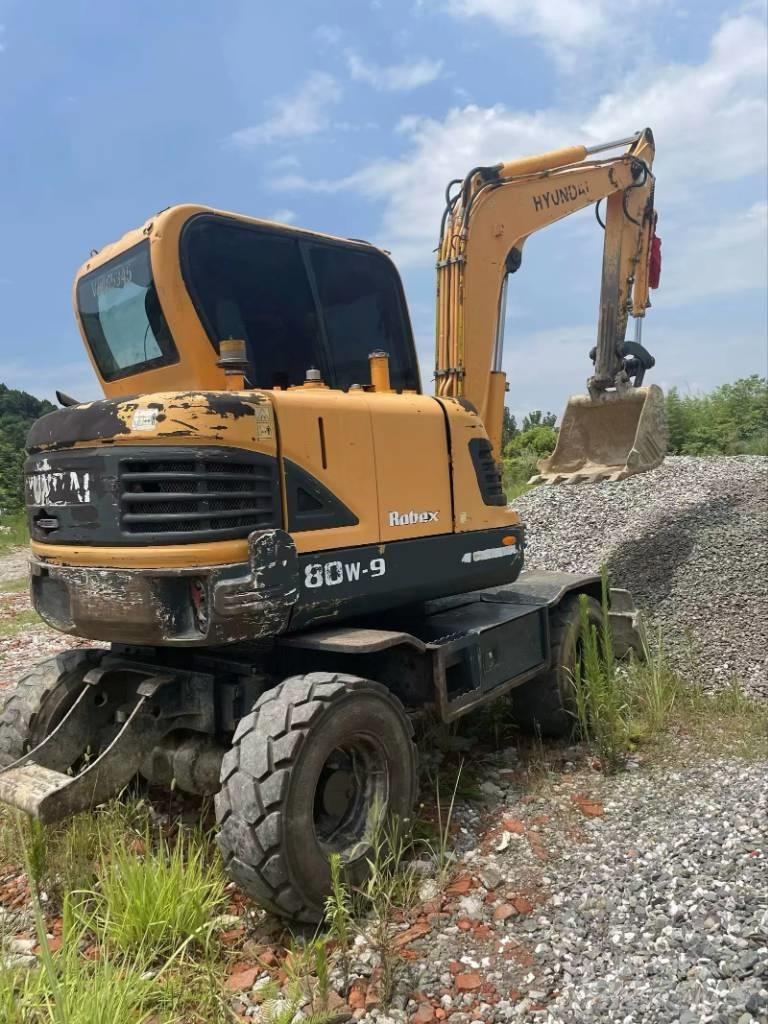 Hyundai 60 W VS Rupsgraafmachines