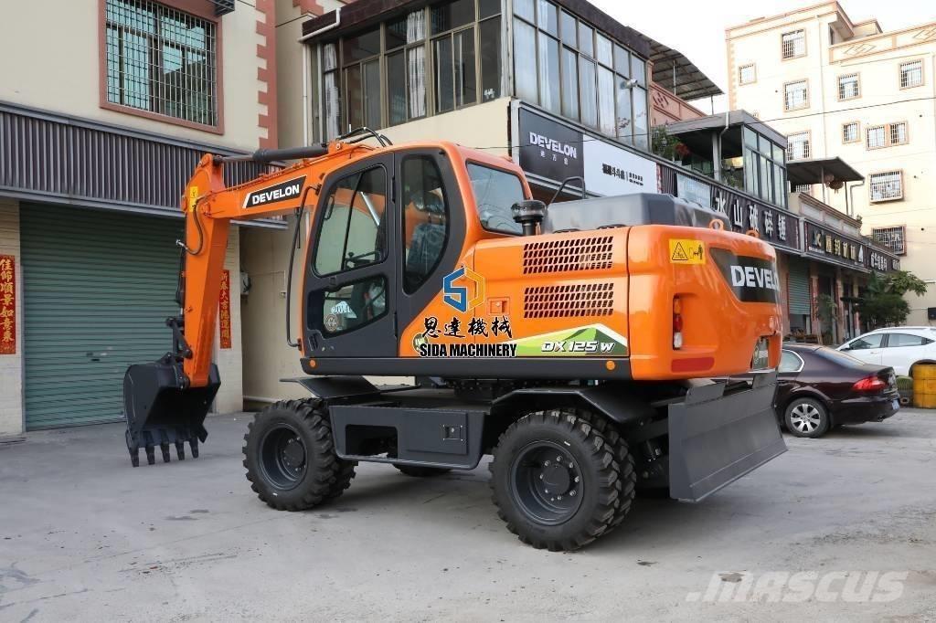 Develon DX125W Wielgraafmachines