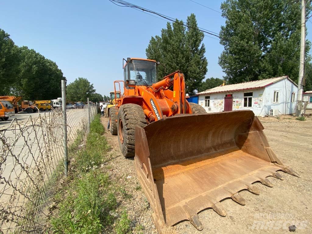 Doosan DL503 Graaf-laadcombinaties