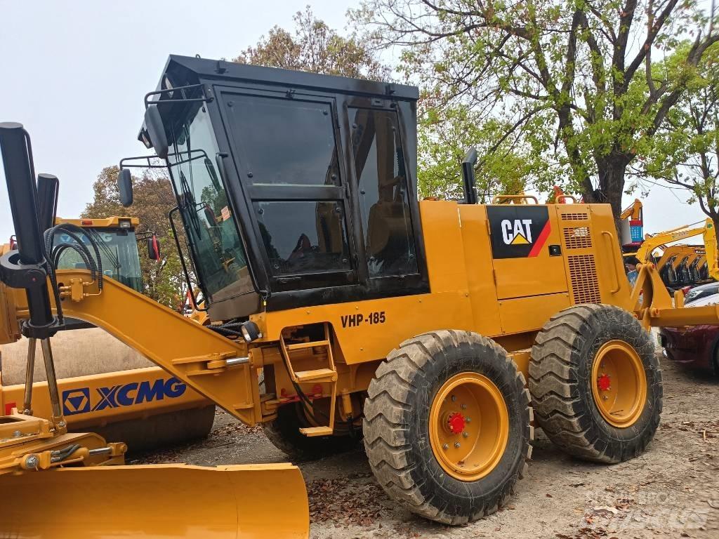 CAT 140 Rupsgraafmachines