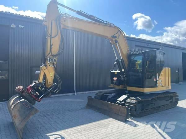 CAT 310 Rupsgraafmachines