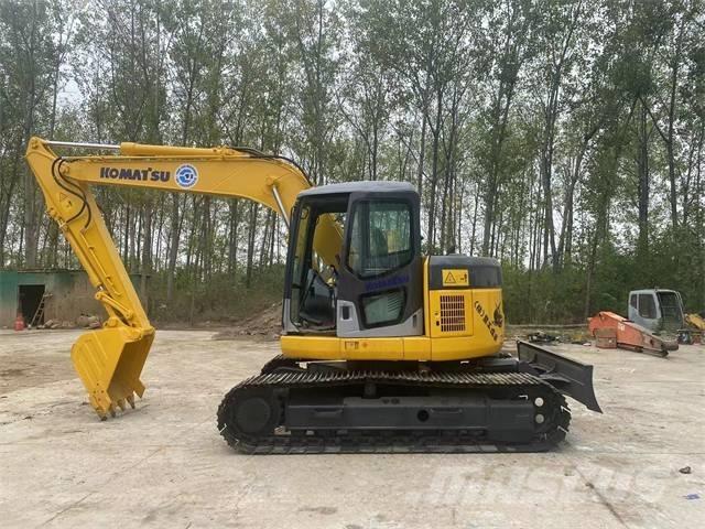 Komatsu PC128US Rupsgraafmachines