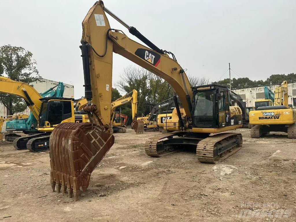 CAT 323D Rupsgraafmachines