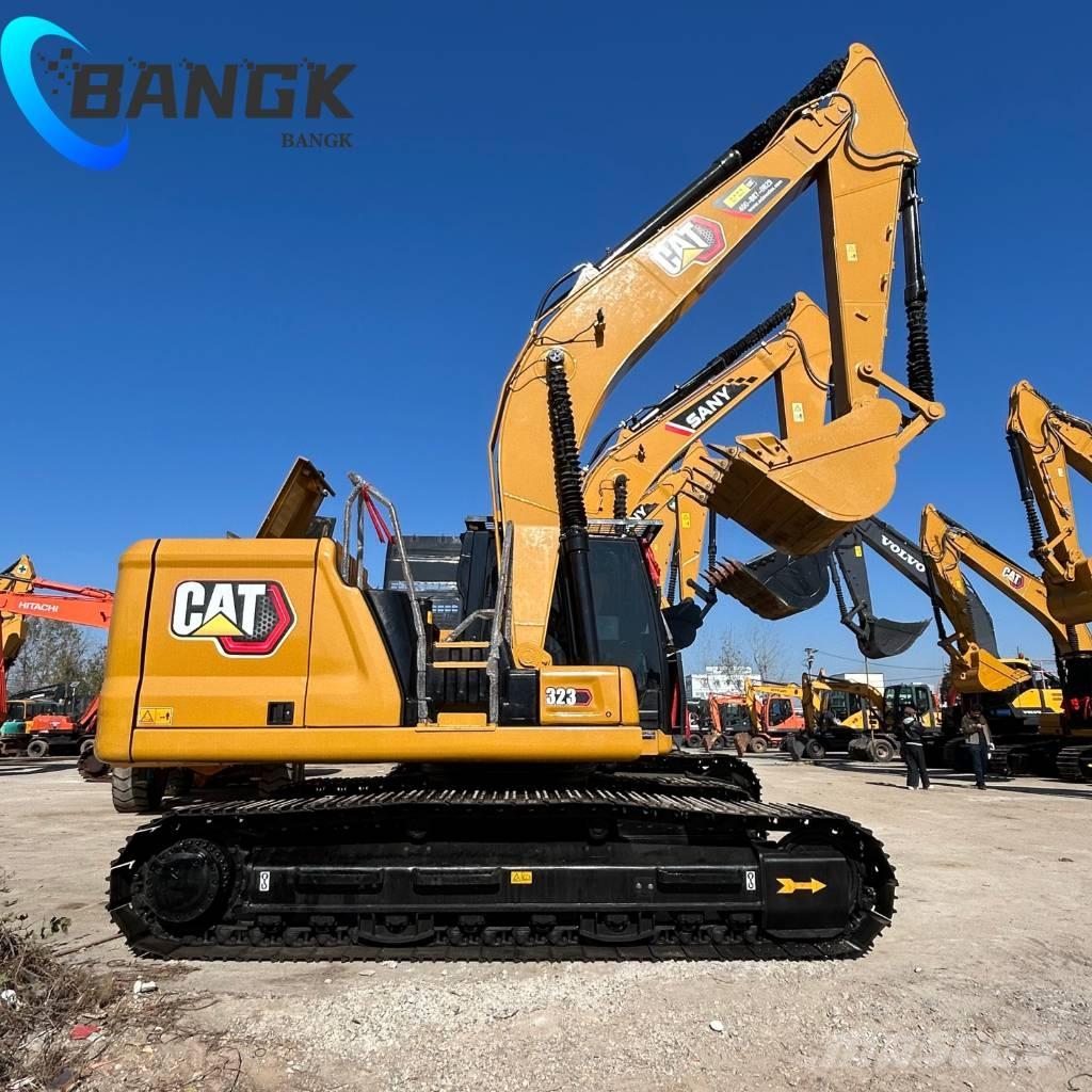 CAT 323 Rupsgraafmachines