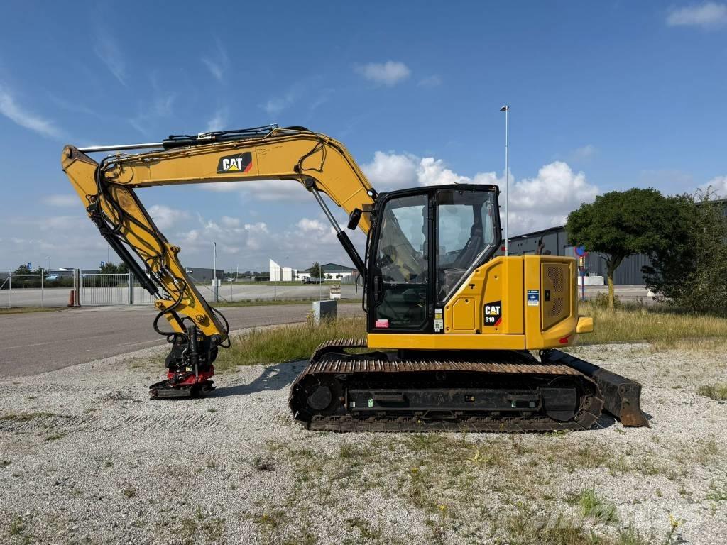 CAT 310 Rupsgraafmachines