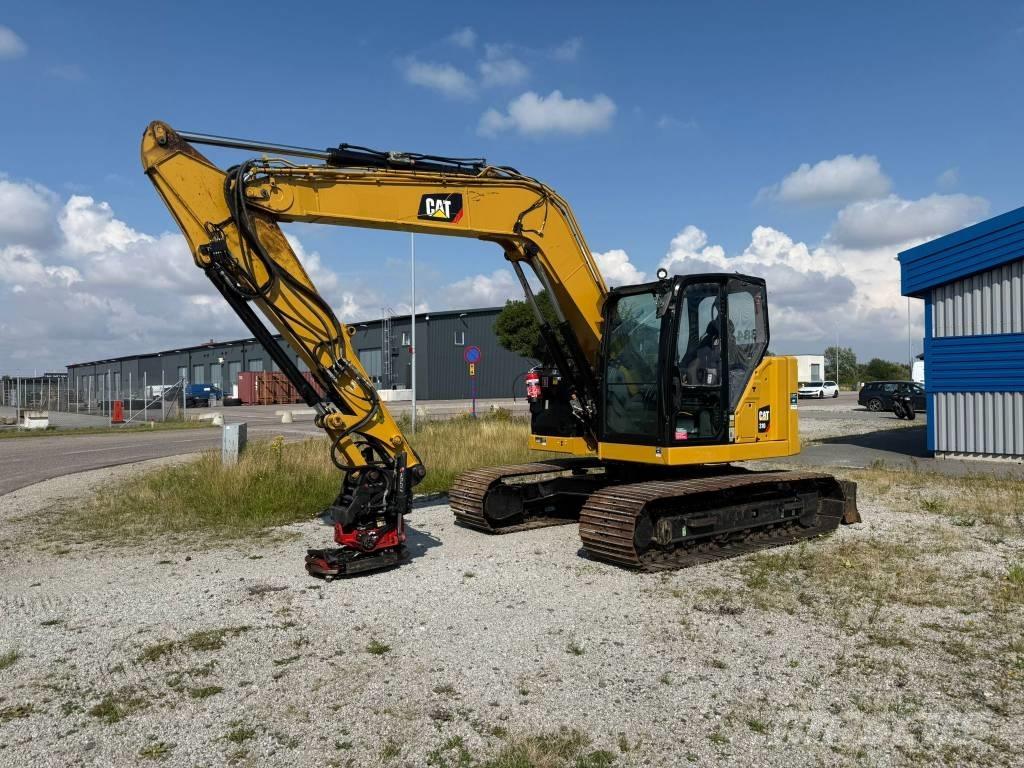 CAT 310 Rupsgraafmachines