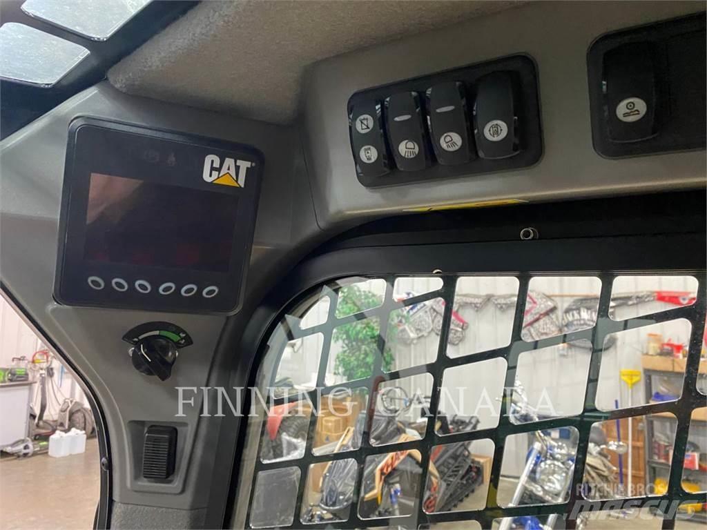 CAT 242D Schrankladers