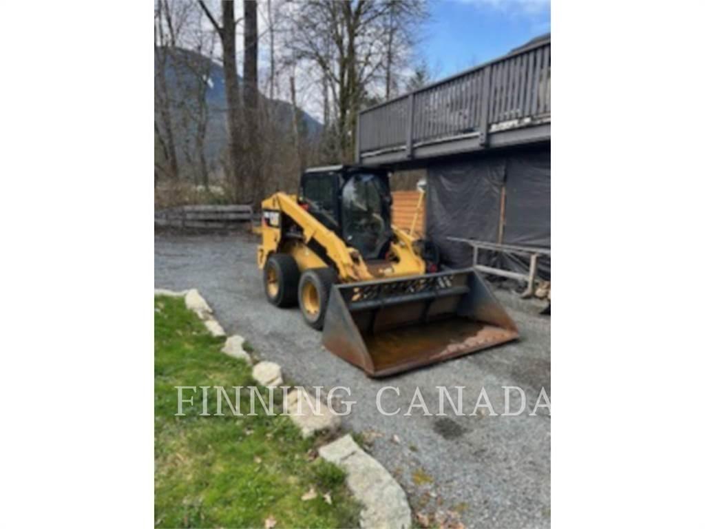 CAT 246D Schrankladers