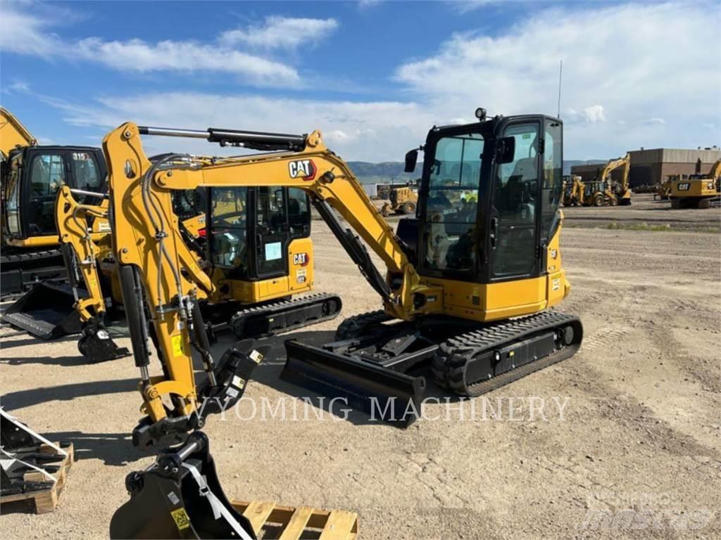 CAT 304 Rupsgraafmachines