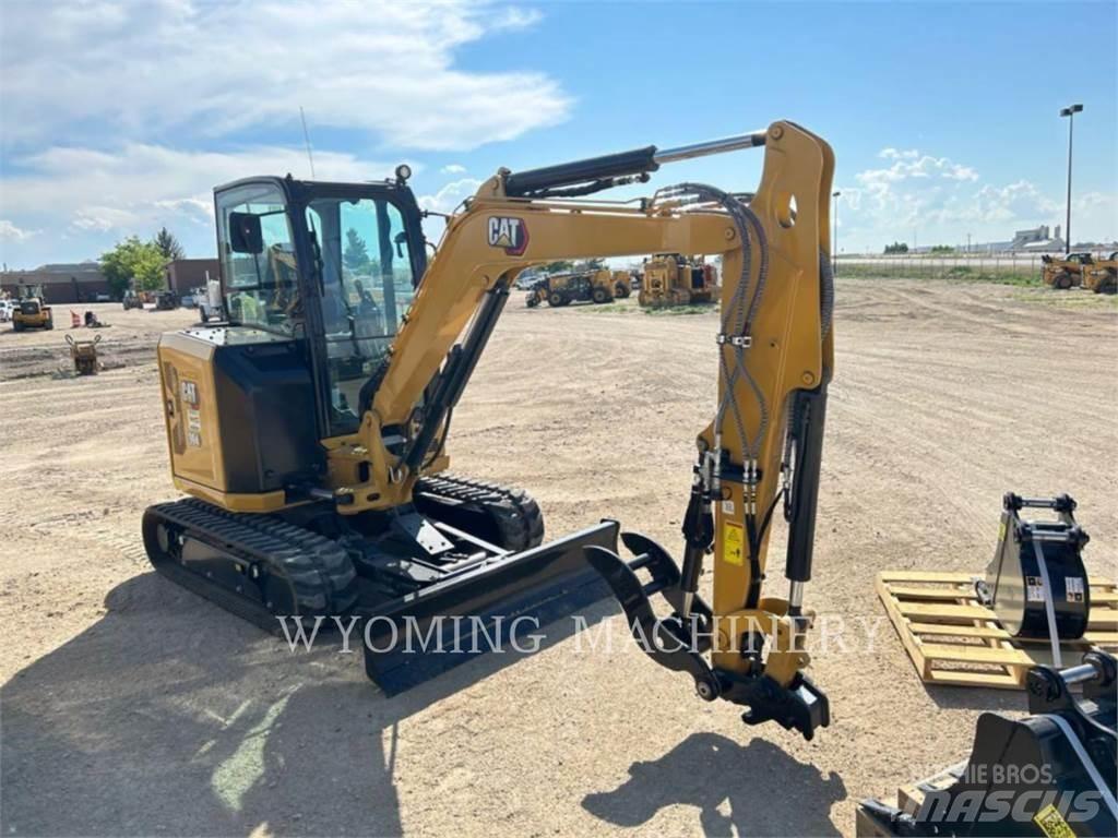 CAT 304 Rupsgraafmachines
