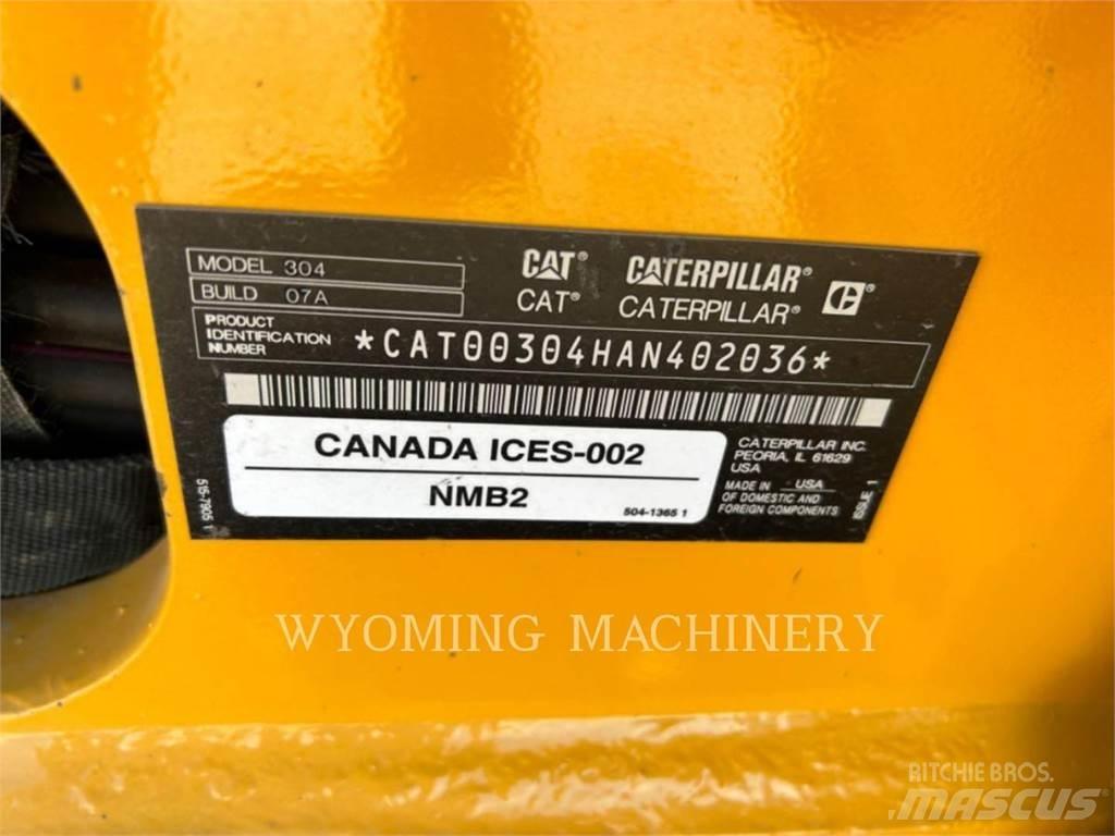 CAT 304 Rupsgraafmachines
