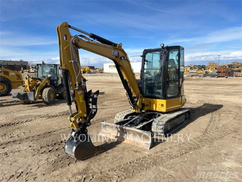 CAT 304 Rupsgraafmachines