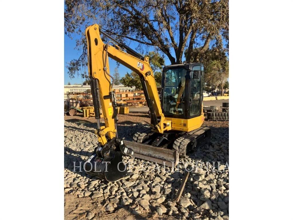 CAT 304 Rupsgraafmachines