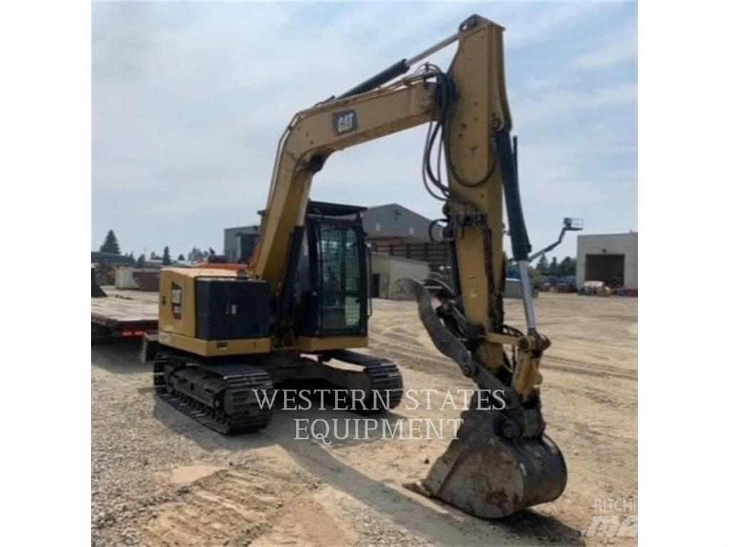 CAT 304 Rupsgraafmachines