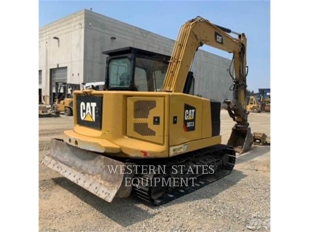 CAT 304 Rupsgraafmachines