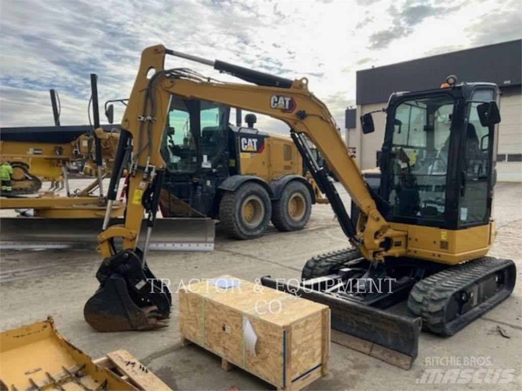 CAT 304 Rupsgraafmachines