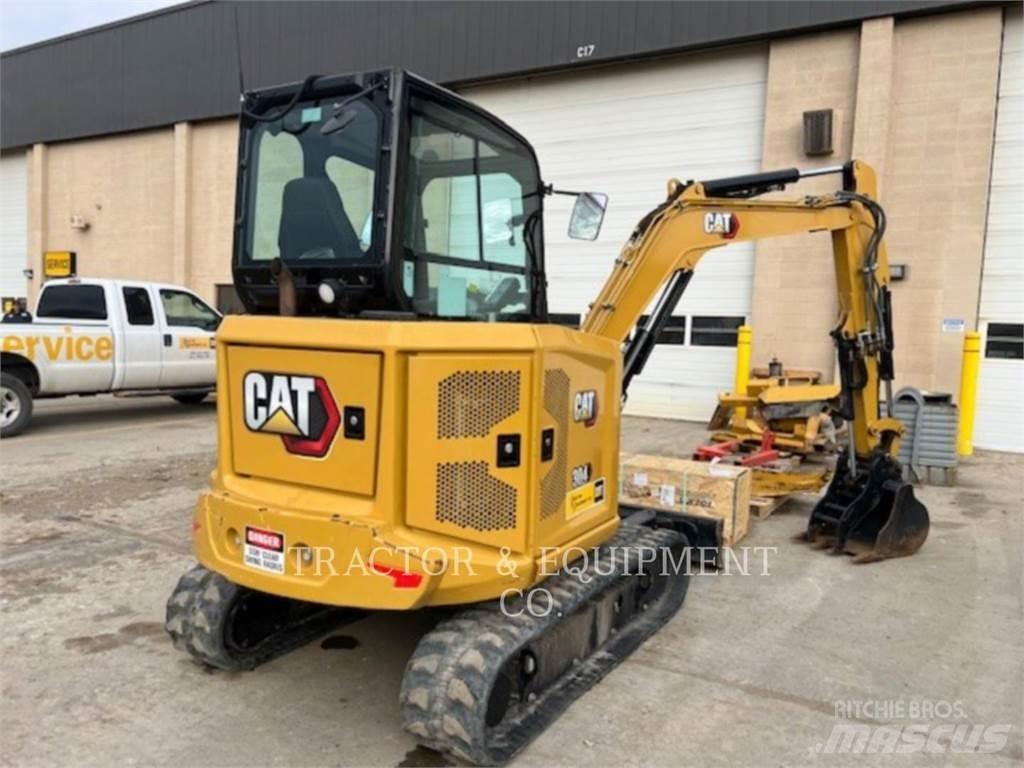 CAT 304 Rupsgraafmachines
