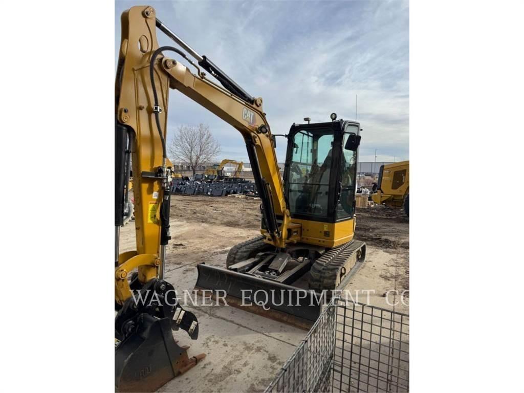 CAT 304 Rupsgraafmachines