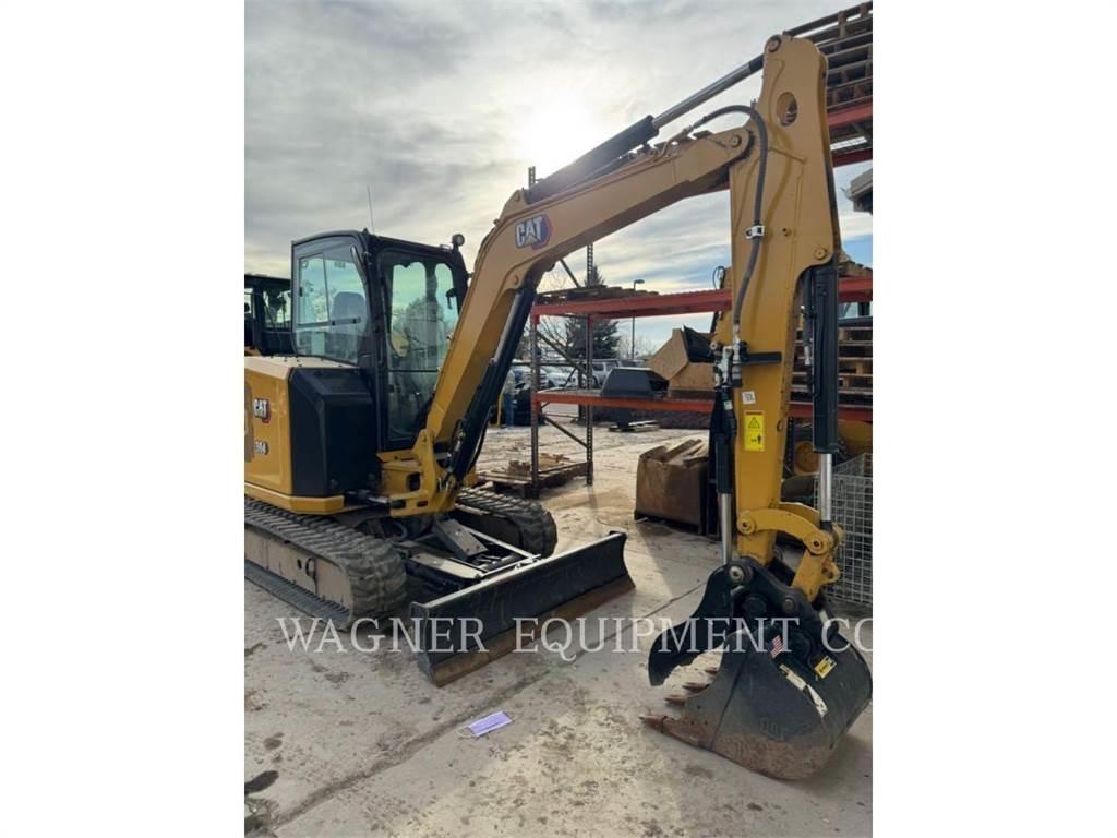 CAT 304 Rupsgraafmachines