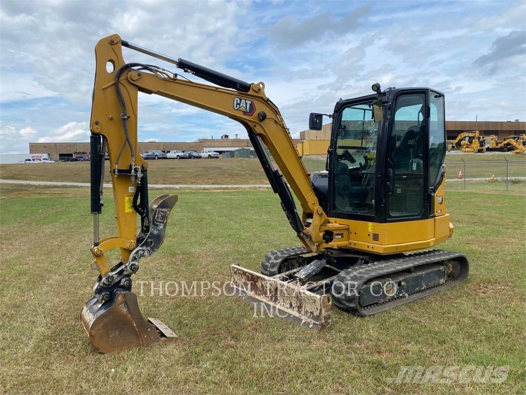 CAT 304 Rupsgraafmachines