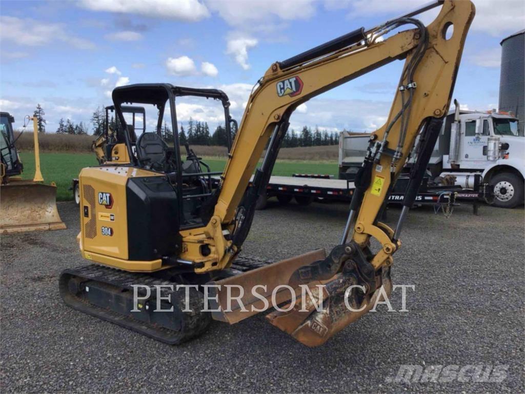 CAT 304 Rupsgraafmachines