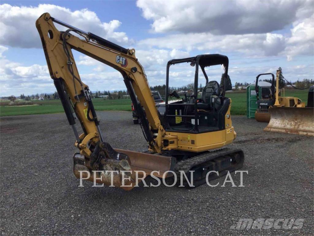 CAT 304 Rupsgraafmachines