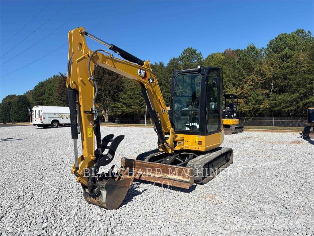 CAT 304 Rupsgraafmachines