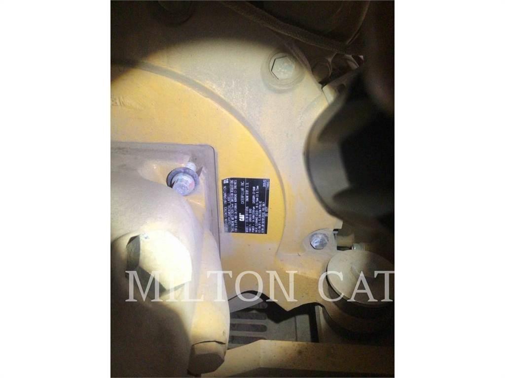 CAT 310 Rupsgraafmachines