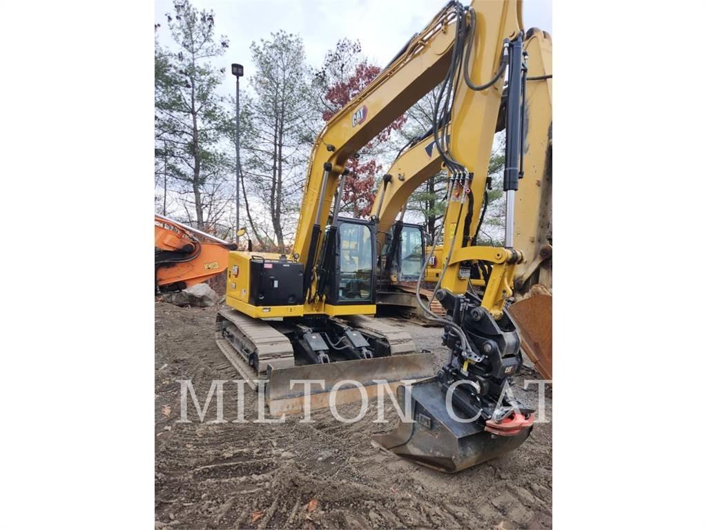 CAT 310 Rupsgraafmachines