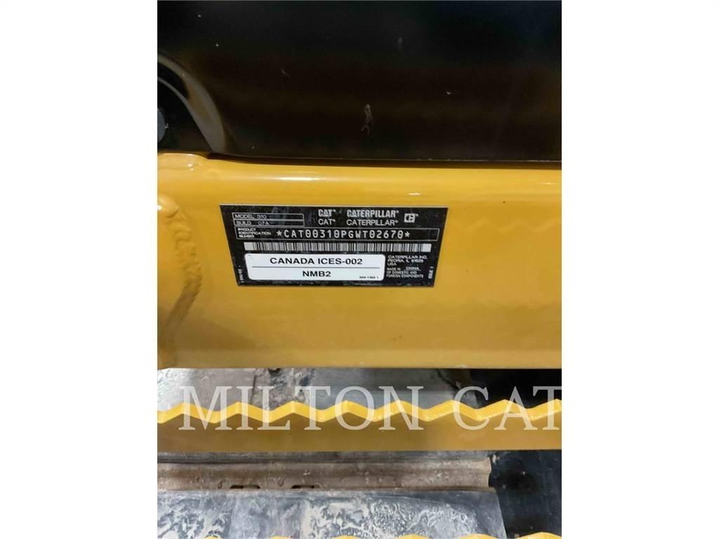 CAT 310 Rupsgraafmachines