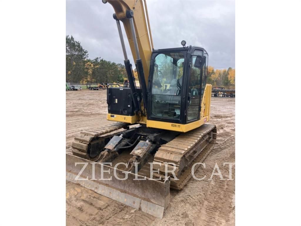 CAT 310 Rupsgraafmachines