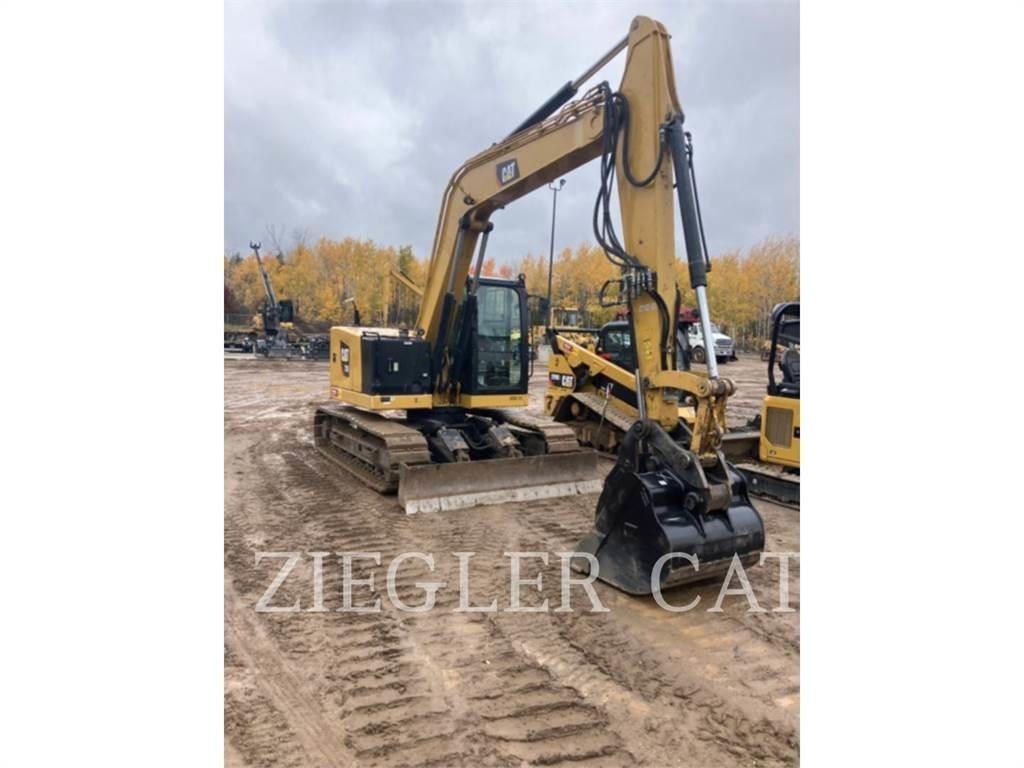 CAT 310 Rupsgraafmachines