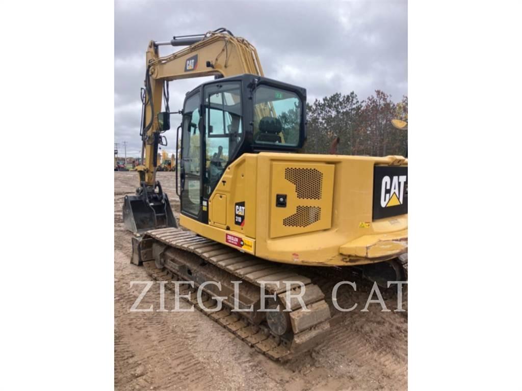 CAT 310 Rupsgraafmachines