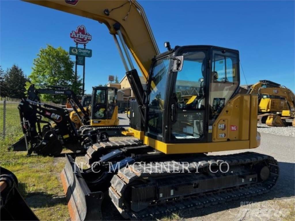 CAT 310 Rupsgraafmachines
