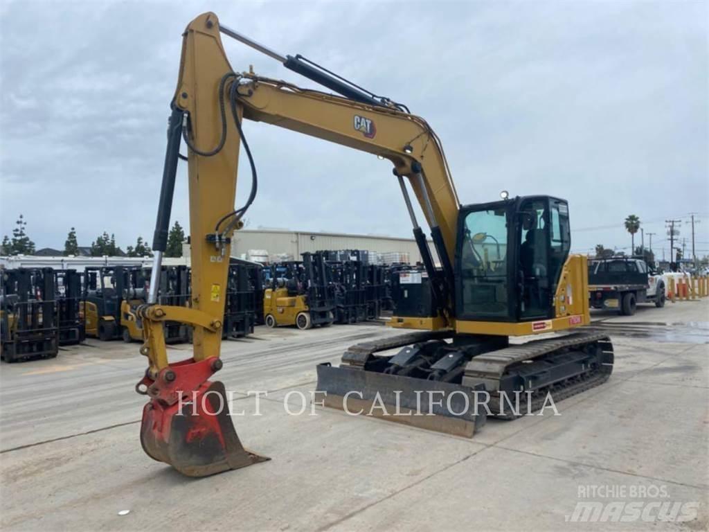 CAT 310 Rupsgraafmachines