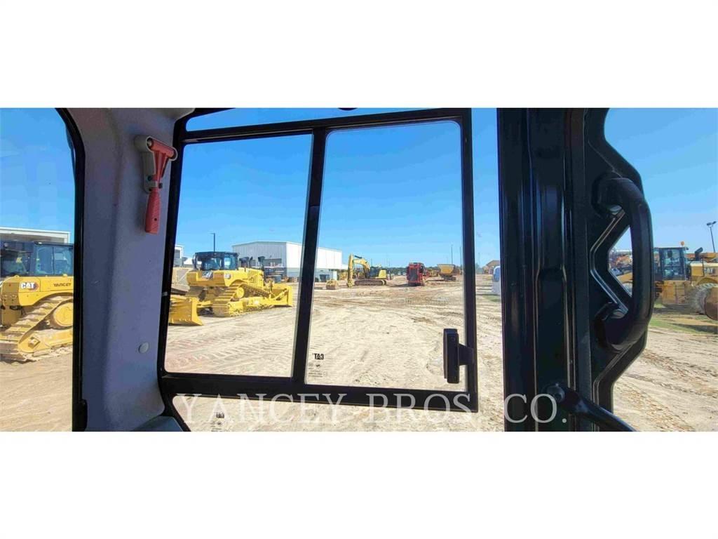 CAT 310 Rupsgraafmachines