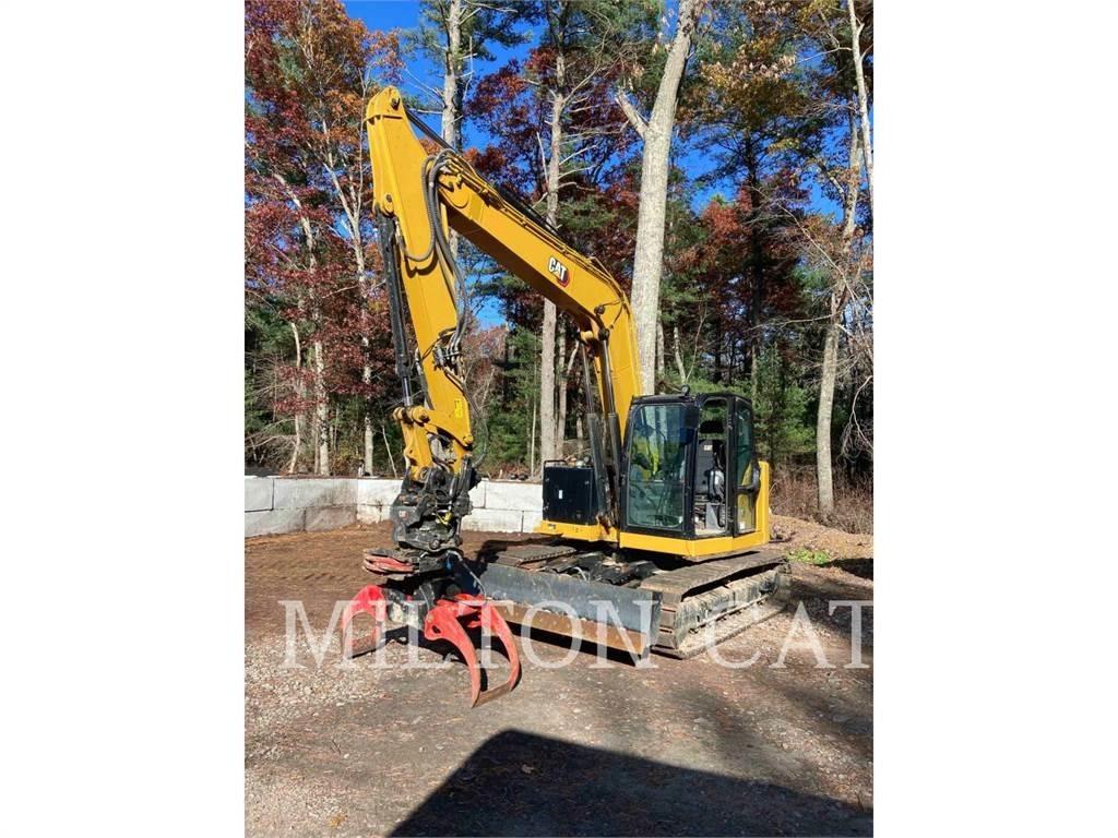 CAT 310 Rupsgraafmachines