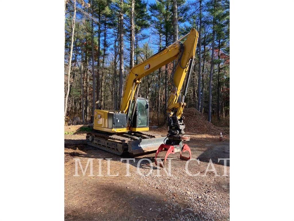 CAT 310 Rupsgraafmachines