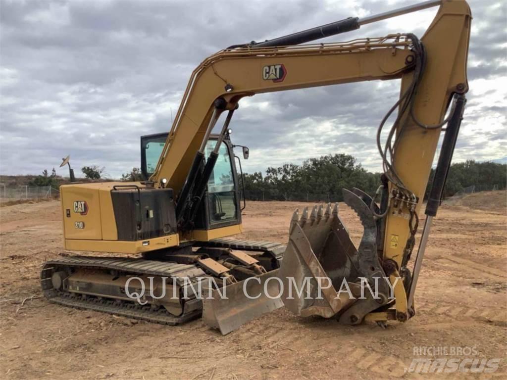 CAT 310 Rupsgraafmachines