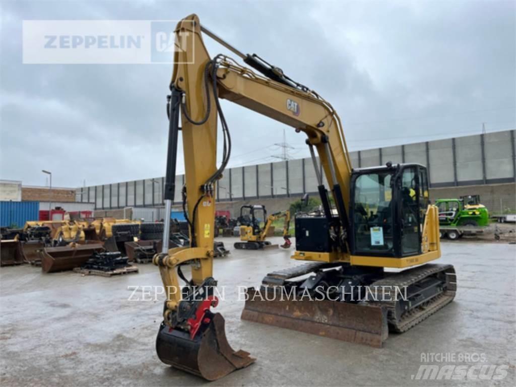 CAT 310 Rupsgraafmachines