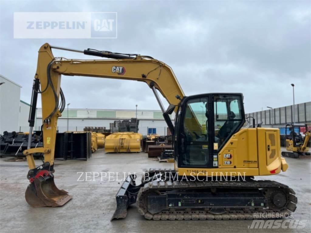 CAT 310 Rupsgraafmachines