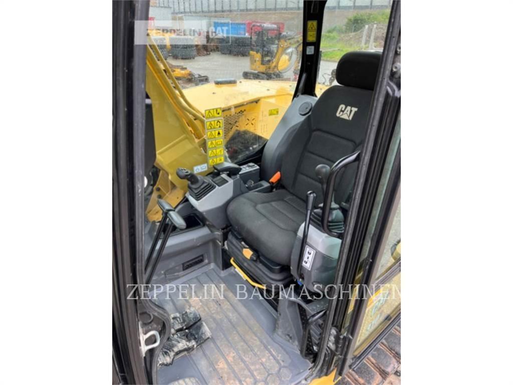 CAT 310 Rupsgraafmachines