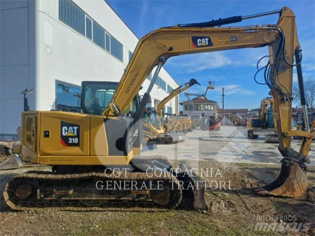 CAT 310 Rupsgraafmachines