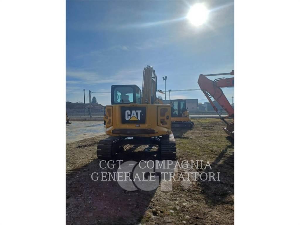 CAT 310 Rupsgraafmachines