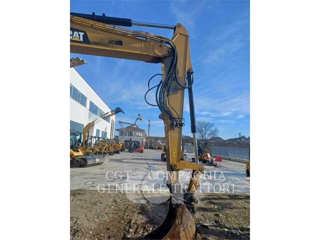 CAT 310 Rupsgraafmachines