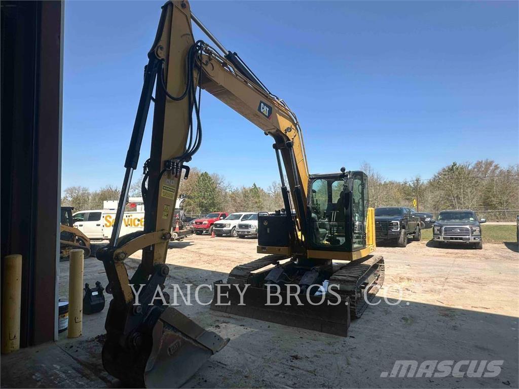 CAT 310 Rupsgraafmachines